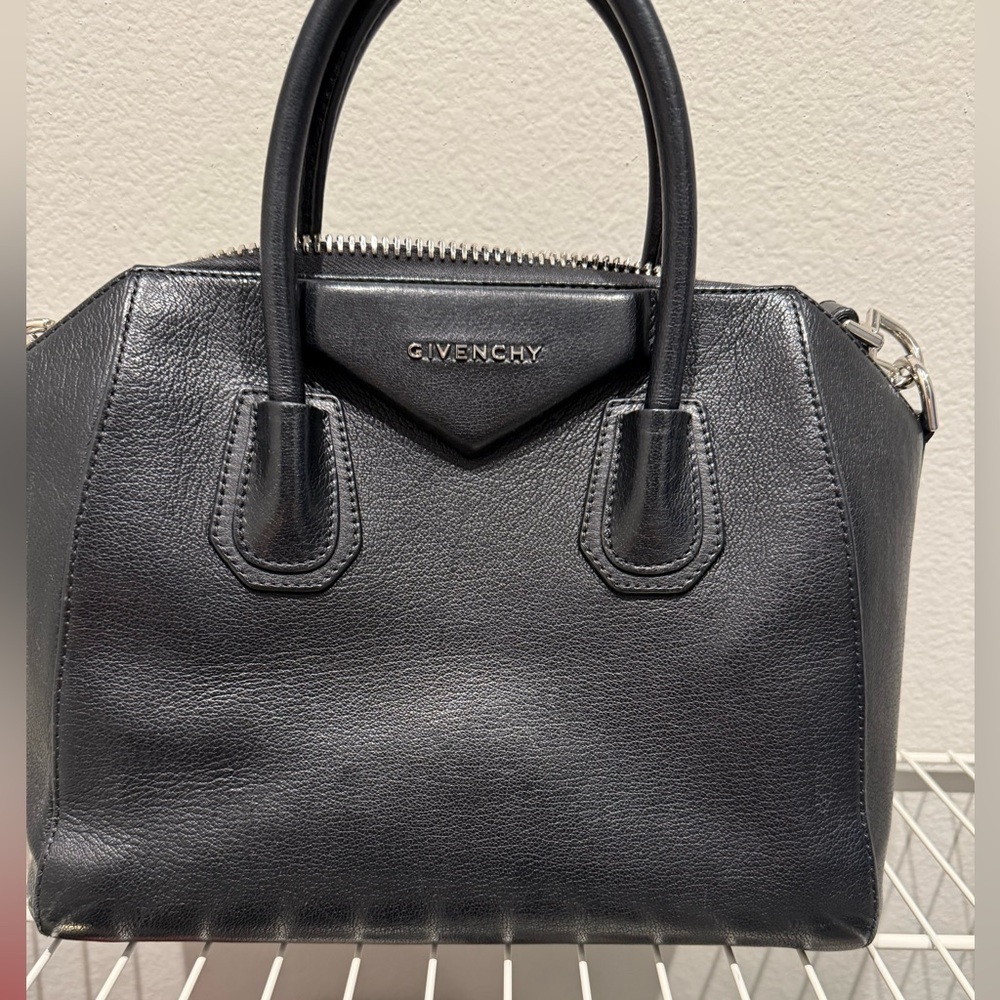 Authentic Gevinchy Black shoulder bag, top handles, leather strap. Medium sized